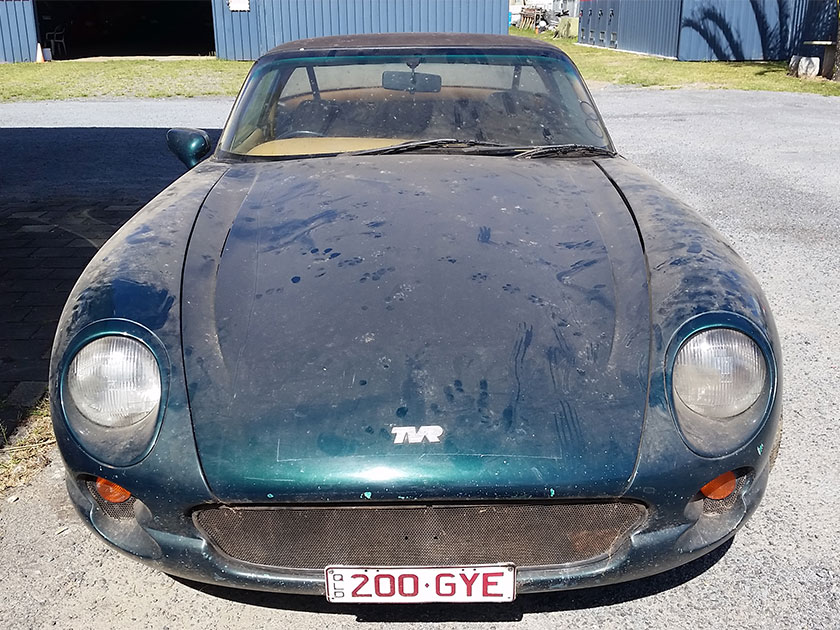 door to door car carrying old TVR